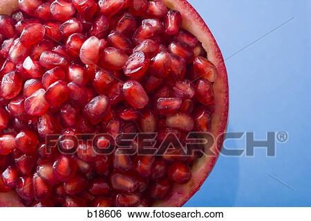 Half of a pomegranate. View Large Photo Image Stock Photograph - Half of a pomegranate.. Fotosearch