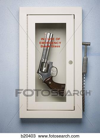 Stock Image - hand gun in a emergency case. Fotosearch