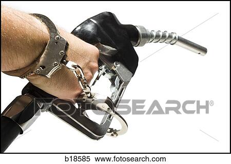 Hand handcuffed to a gas pump. View Large Photo Image Stock Photography - Hand handcuffed to a gas pump.. Fotosearch