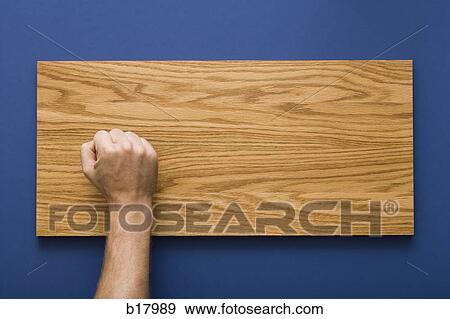 Hand on a wooden plank. View Large Photo Image Stock Photo - Hand on a wooden plank.. Fotosearch