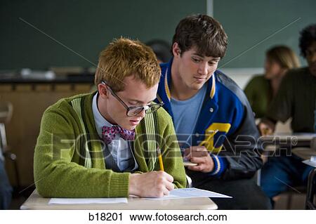High school boy jock cheating off a high school nerd. View Large Photo Image Stock Image - High school boy jock cheating off a high school nerd.. Fotosearch
