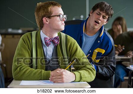 High school boy jock cheating off a high school nerd. View Large Photo Image Stock Image - High school boy jock cheating off a high school nerd.. Fotosearch