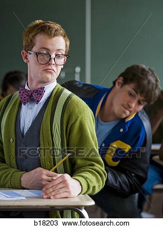 High school boy jock cheating off a high school nerd. View Large Photo Image Stock Image - High school boy jock cheating off a high school nerd.. Fotosearch