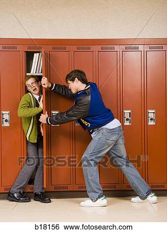 High school jock pushing nerd in locker. View Large Photo Image Stock Photograph - High school jock pushing nerd in locker.. Fotosearch