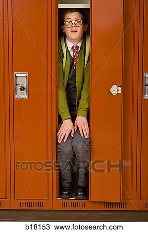 High school nerd stuck in locker. View Large Photo Image Stock Image - High school nerd stuck in locker.. Fotosearch