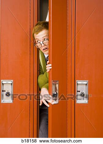 High school nerd stuck in locker. View Large Photo Image Stock Photo - High school nerd stuck in locker.. Fotosearch