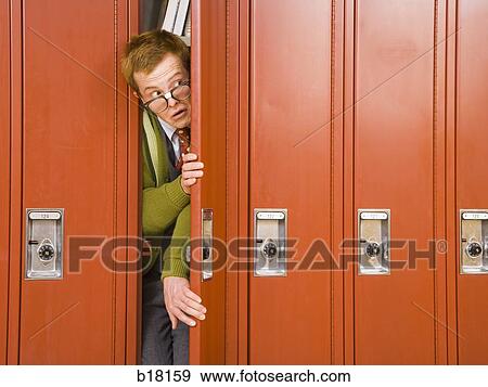 High school nerd stuck in locker. View Large Photo Image Stock Photo - High school nerd stuck in locker.. Fotosearch