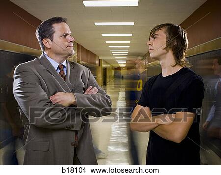 High School Principal and teenage boy. View Large Photo Image Picture - High School Principal and teenage boy.. Fotosearch
