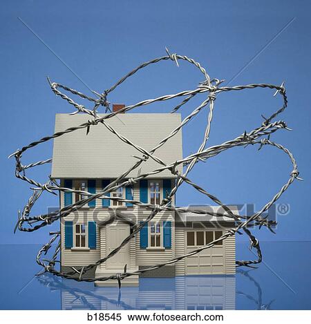 Home surrounded by barbed wire. View Large Photo Image Stock Photography - Home surrounded by barbed wire.. Fotosearch