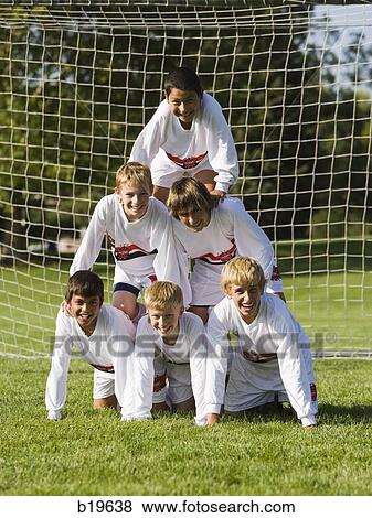 human pyramid of young soccer players View Large Photo Image Stock Photo - human pyramid of young soccer players. Fotosearch