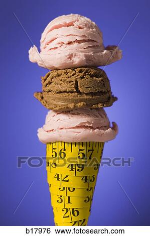 Ice cream cone made out of tape measure with 3 scoops of ice cream. View Large Photo Image Stock Photograph - Ice cream cone made out of tape measure with 3 scoops of ice cream.. Fotosearch
