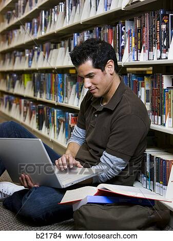 Picture - in the library. Fotosearch