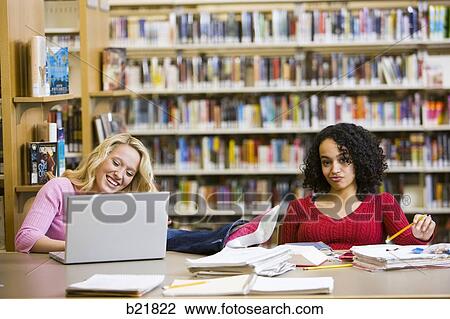 Stock Image - in the library. Fotosearch