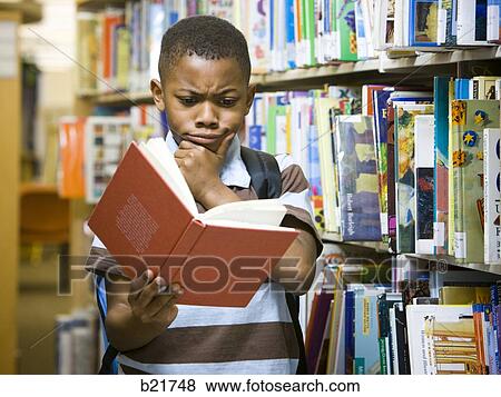 in the library View Large Photo Image Stock Photo - in the library. Fotosearch