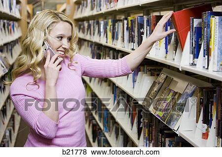 in the library View Large Photo Image Stock Photo - in the library. Fotosearch