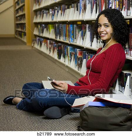 in the library View Large Photo Image Stock Photo - in the library. Fotosearch