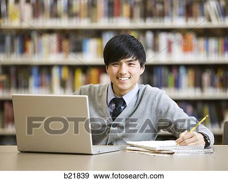 Stock Photo - in the library. Fotosearch