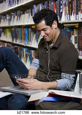 in the library View Large Photo Image Stock Photograph - in the library. Fotosearch