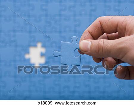 Jigsaw puzzle with a missing piece. View Large Photo Image Stock Photo - Jigsaw puzzle with a missing piece.. Fotosearch