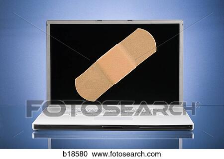 Laptop computer with a Band-aid on the screen. View Large Photo Image Stock Image - Laptop computer with a Band-aid on the screen.. Fotosearch