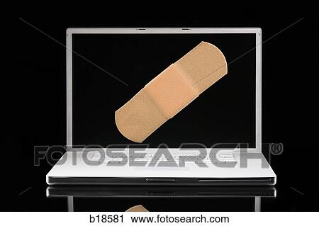 Laptop computer with a Band-aid on the screen. View Large Photo Image Stock Image - Laptop computer with a Band-aid on the screen.. Fotosearch