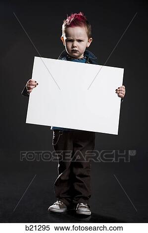 Stock Photography - little boy in a jean jacket. Fotosearch