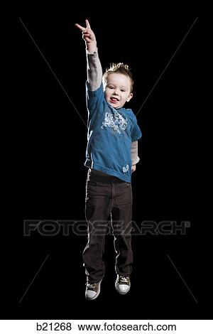 Stock Photo - little boy making peace sign. Fotosearch