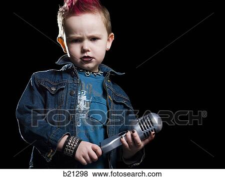 little boy singing into a microphone View Large Photo Image Stock Photo - little boy singing into a microphone. Fotosearch