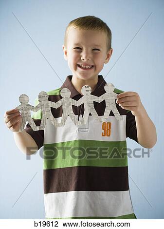 little boy with a paper cutout View Large Photo Image Stock Image - little boy with a paper cutout. Fotosearch