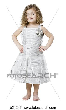 Stock Photograph - little girl in a newspaper dress. Fotosearch