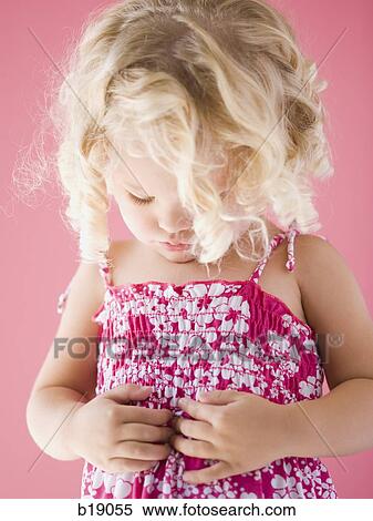 Stock Photography - little girl in a pink dress.. Fotosearch