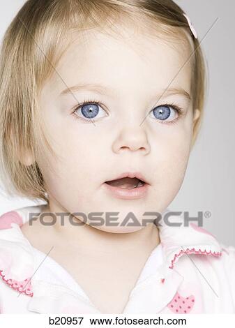 Stock Photo - little girl in pajamas. Fotosearch