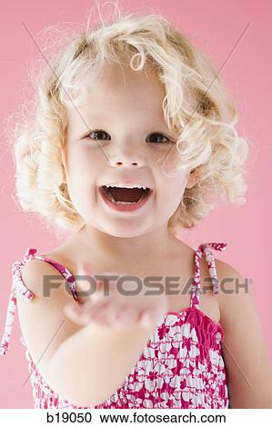Stock Image - little girl smiling.. Fotosearch
