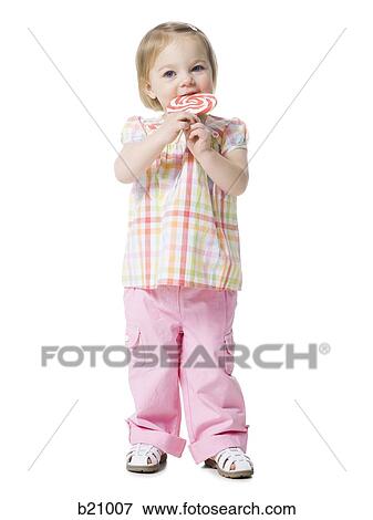 little girl with a lollipop View Large Photo Image Stock Photo - little girl with a lollipop. Fotosearch