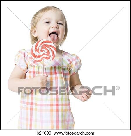 little girl with a lollipop View Large Photo Image Stock Photo - little girl with a lollipop. Fotosearch