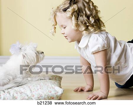 little girl with dog View Large Photo Image Stock Photo - little girl with dog. Fotosearch