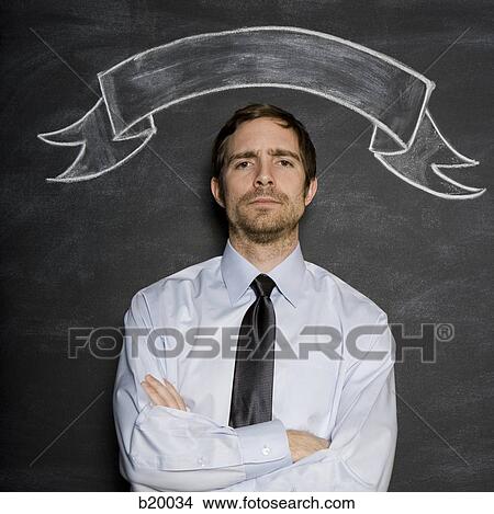 man against a blackboard View Large Photo Image Picture - man against a blackboard. Fotosearch