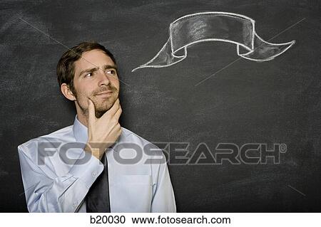 man against a blackboard View Large Photo Image Stock Image - man against a blackboard. Fotosearch