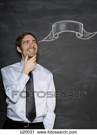 man against a blackboard View Large Photo Image Stock Image - man against a blackboard. Fotosearch