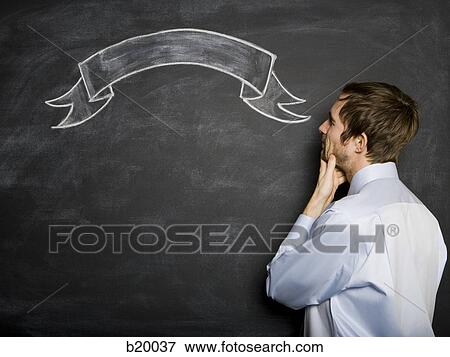 man against a blackboard View Large Photo Image Stock Photo - man against a blackboard. Fotosearch