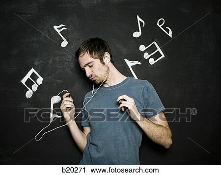 man against a chalkboard View Large Photo Image Stock Image - man against a chalkboard. Fotosearch