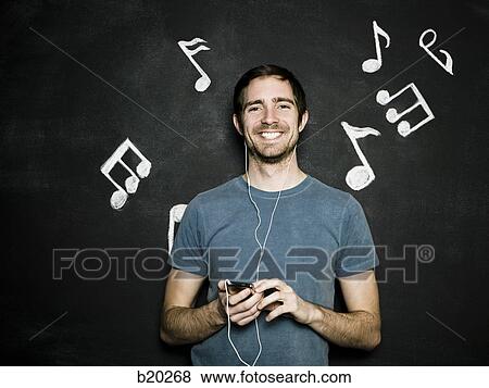 man against a chalkboard View Large Photo Image Stock Photo - man against a chalkboard. Fotosearch