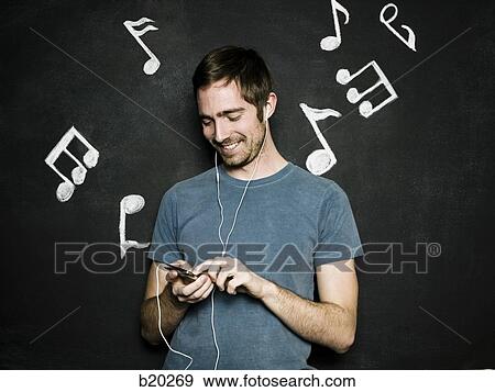 man against a chalkboard View Large Photo Image Stock Photo - man against a chalkboard. Fotosearch