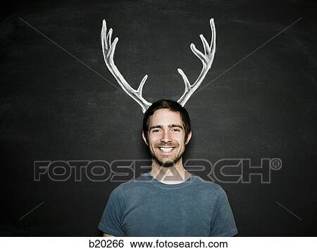 man against a chalkboard View Large Photo Image Stock Photograph - man against a chalkboard. Fotosearch