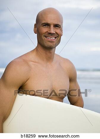 Stock Photo - Man at the beach.. Fotosearch