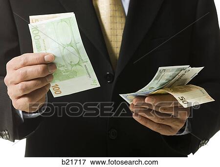 man counting money View Large Photo Image Stock Photo - man counting money. Fotosearch