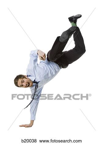man doing a handstand View Large Photo Image Stock Photo - man doing a handstand. Fotosearch