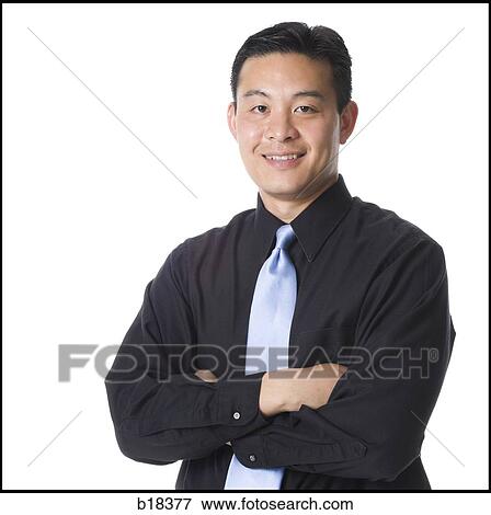 Man folding his arms and smiling. View Large Photo Image Stock Photo - Man folding his arms and smiling.. Fotosearch