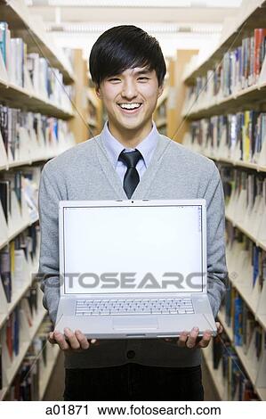 man in the library View Large Photo Image Stock Image - man in the library. Fotosearch