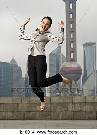 Man jumping in the air. View Large Photo Image Picture - Man jumping in the air.. Fotosearch